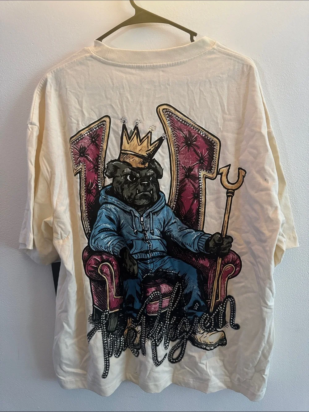 True Religion Cream Short Sleeve Tee with Crowned Dog Graphic and Brand Banner